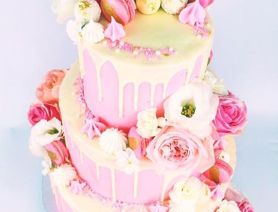 Yellow and pink drip wedding cake