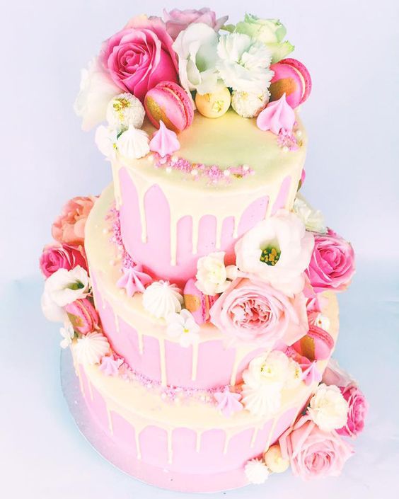 Yellow and pink drip wedding cake