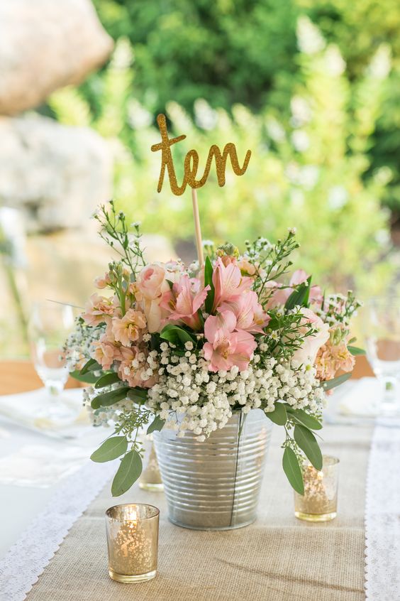 blush wedding flowers gold glitter wedding table numbers