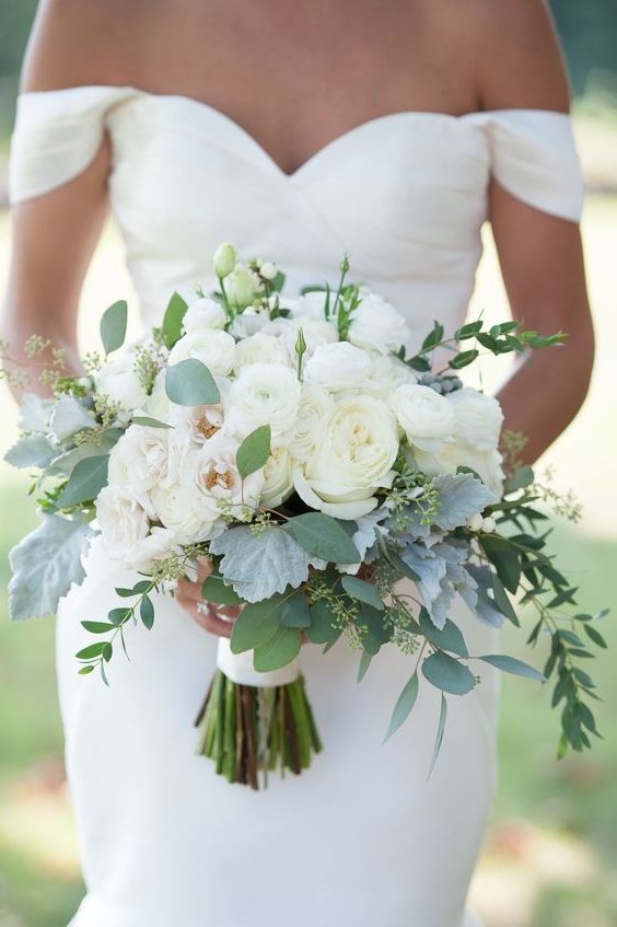roses, ranunculus, liasianthus, dusty miller, snowberry, eucalyptus wedding bouquet