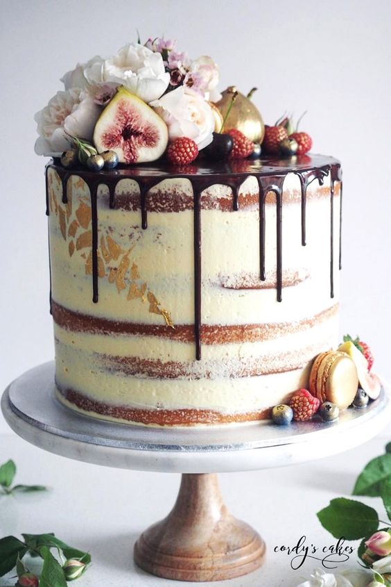 rustic naked drip wedding cake with fruits