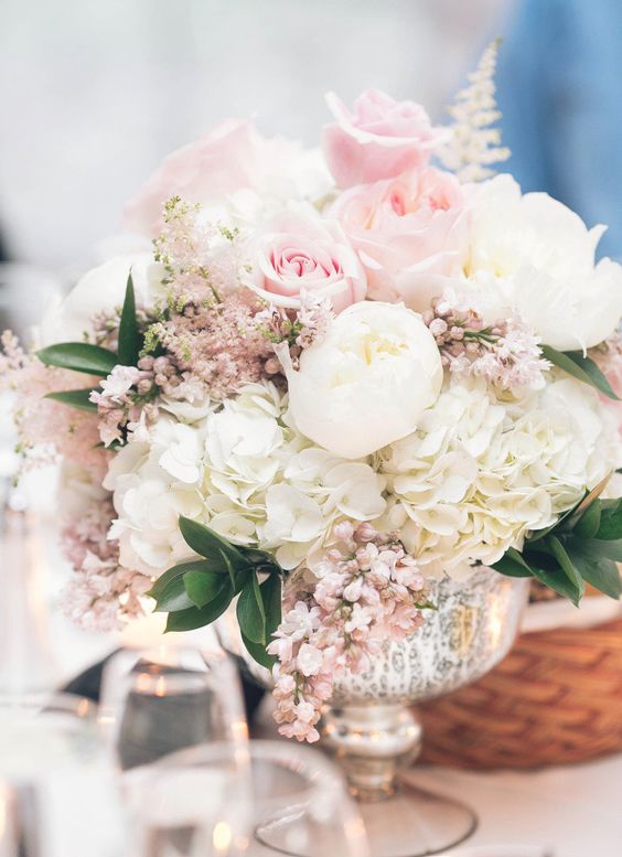 white and blush pink wedding centerpiece