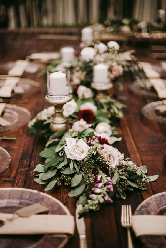 willow eucalyptus filled with vendela roses burgundy wedding centerpiece