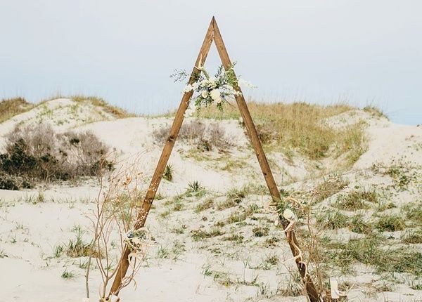 Minimalist ceremony arch for alternative modern beach wedding