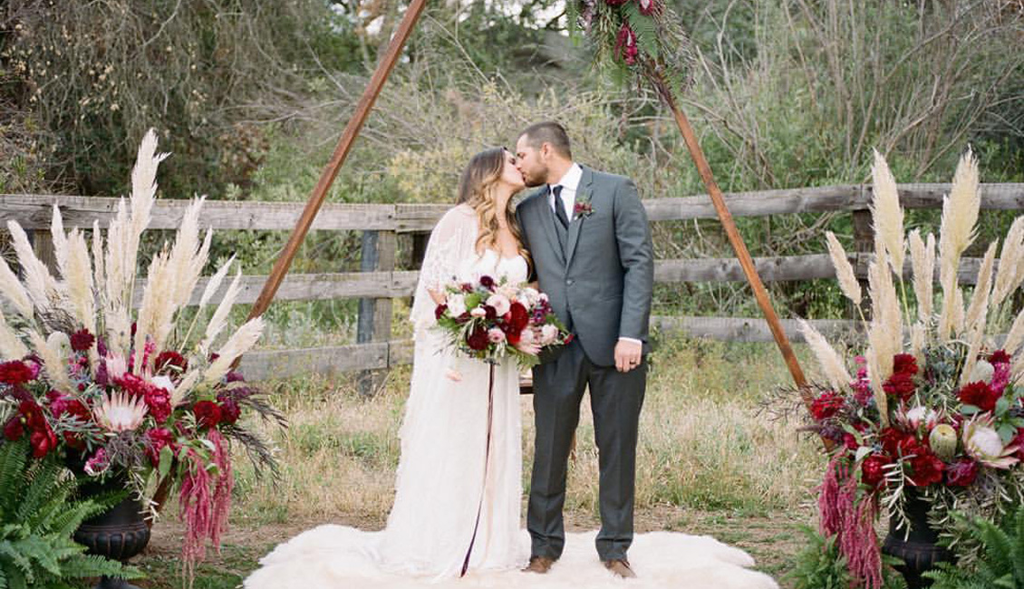 Pampas Grass burgundy fall wedding arch 1