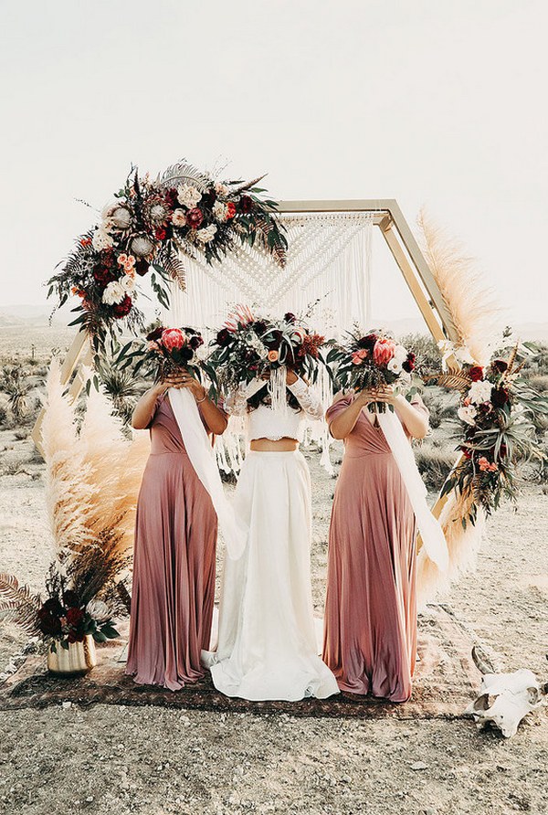 boho hexagon wedding arch with pampas grass and dusty roses bridesmaid dresses