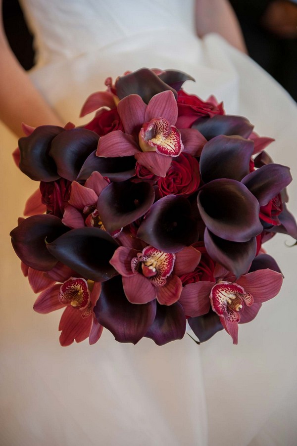 Burgundy callas with deep cherry orchids wedding bouquet