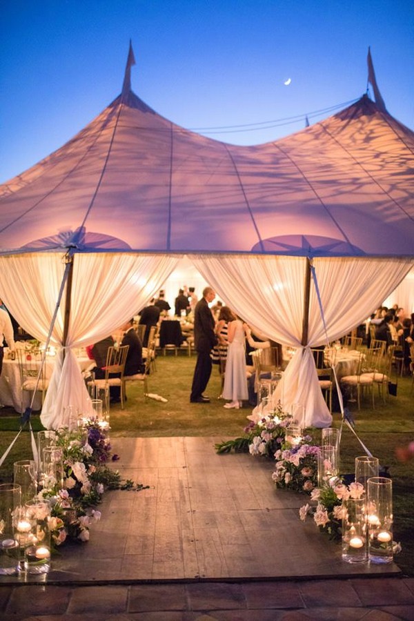 Outdoor romantic wedding tent lighting and layout idea