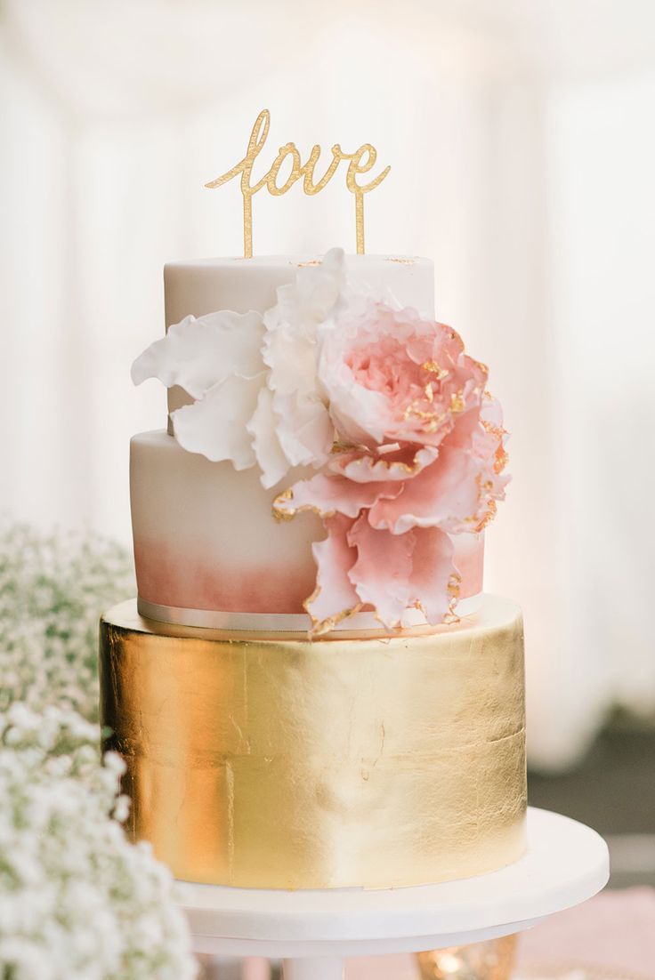 blush pink and gold wedding cake