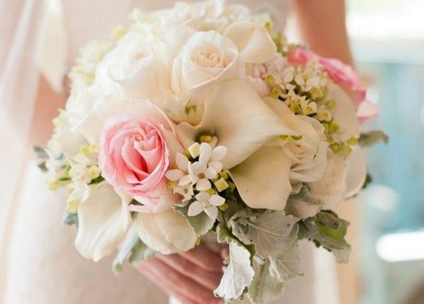 bridal bouquet with roses and calla lilies