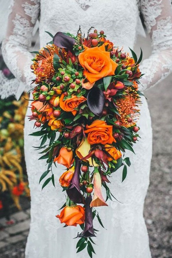 cascading wedding fall bouquet with purple and orange flowers