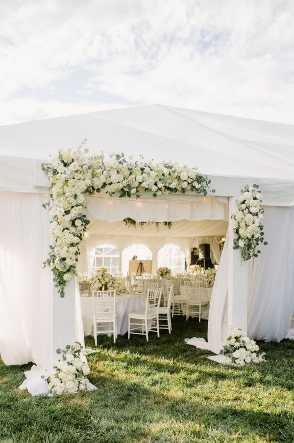 elegant white and greenery tented wedding reception decoration ideas