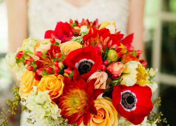riotous red anemone and orange wedding bouquet