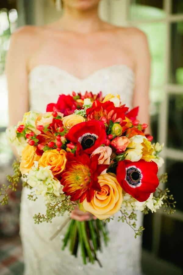 riotous red anemone and orange wedding bouquet