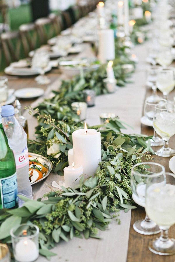 seeded eucalyptus and candles wedding garland decoration idea