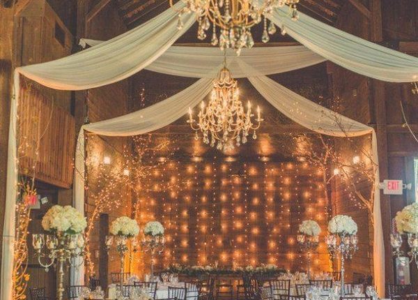 barn wedding reception ideas with draping fabric