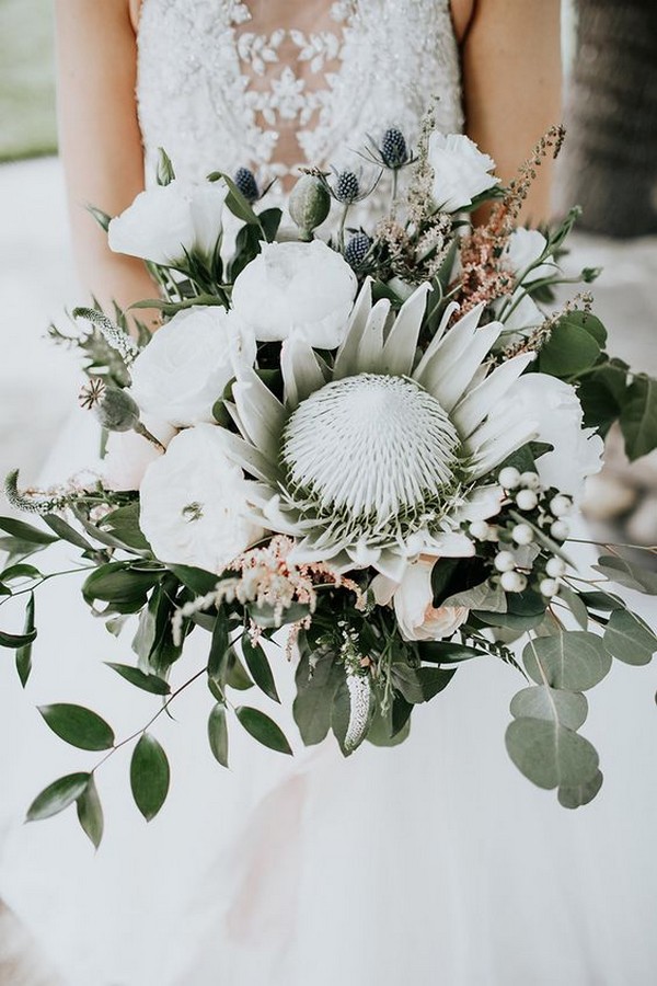 bohemian white blush and greenery wedding bouquet with king protea