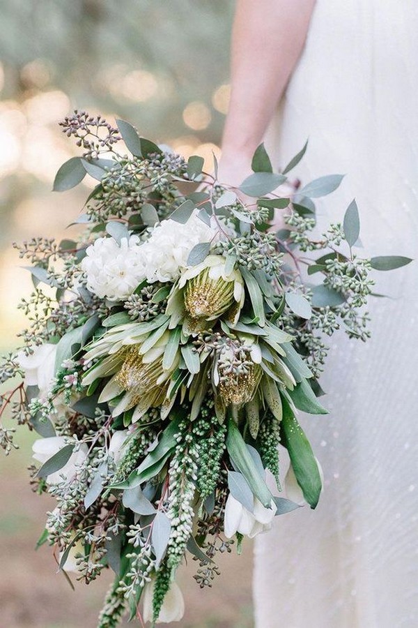 greenery wedding bouquet with king protea