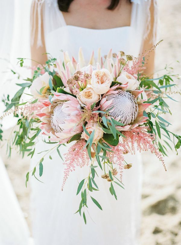 pink king protea and greenery wedding bouqut