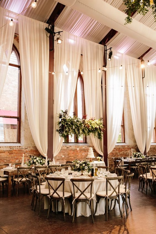 romantic wedding reception with ivory draping