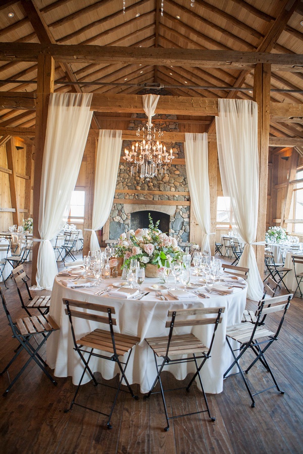 rustic barn wedding reception with fabric draping