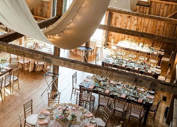 wedding reception set in a barn