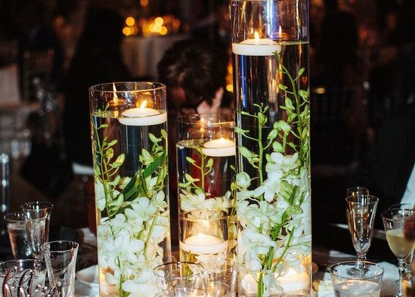 Centerpieces with Floating Candles and White Florals