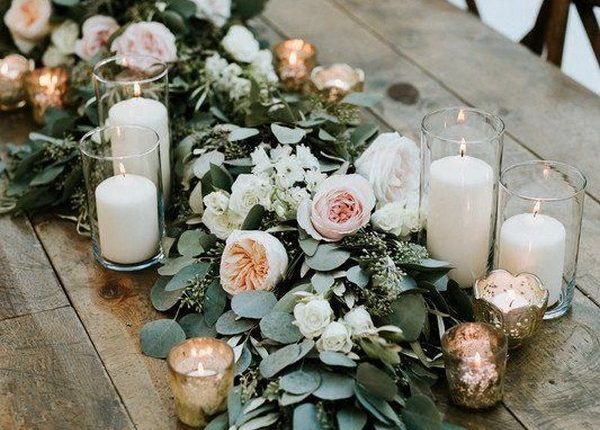 Greenery wedding centerpiece with candles