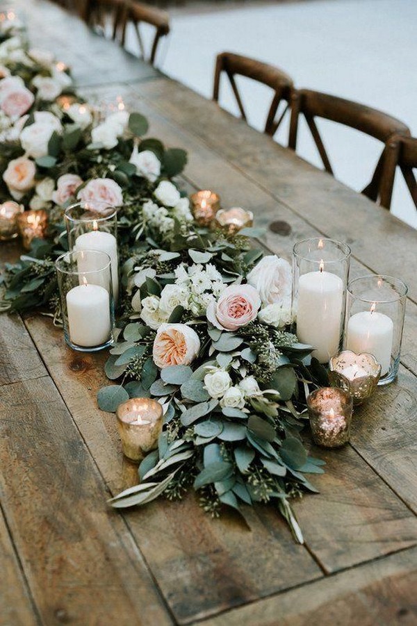 Greenery wedding centerpiece with candles
