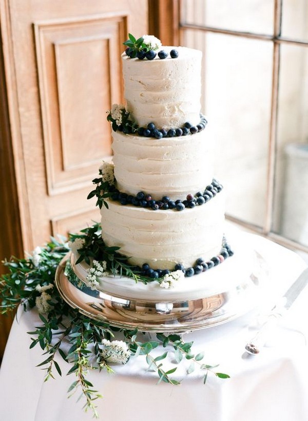 blueberries and greenery simple wedding cake