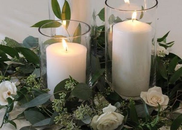 greenery and candles centerpieces