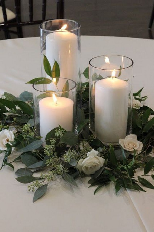 greenery and candles centerpieces