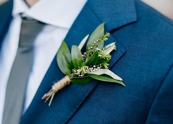 navy blue grooms suit with greenery boutonniere