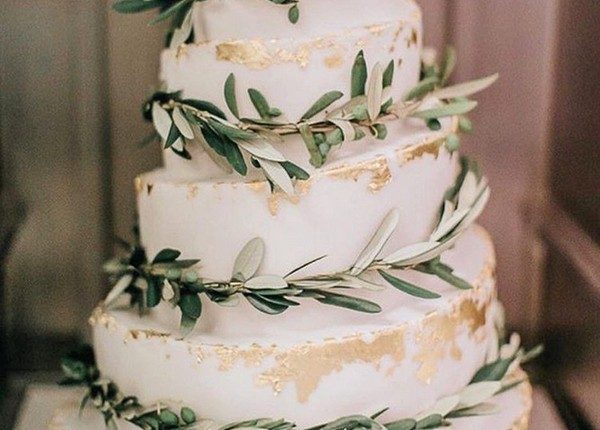 olive greenery and gold wedding cake