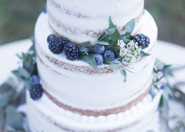 rustic naked blueberry wedding cake