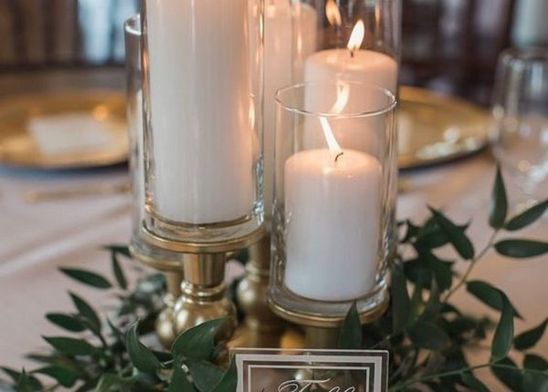 simple wedding centerpiece ideas with candles and greenery