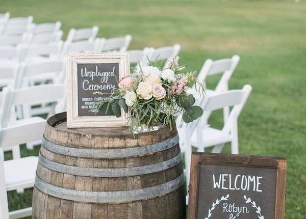 outdoor country wedding ceremony ideas with wine barrles