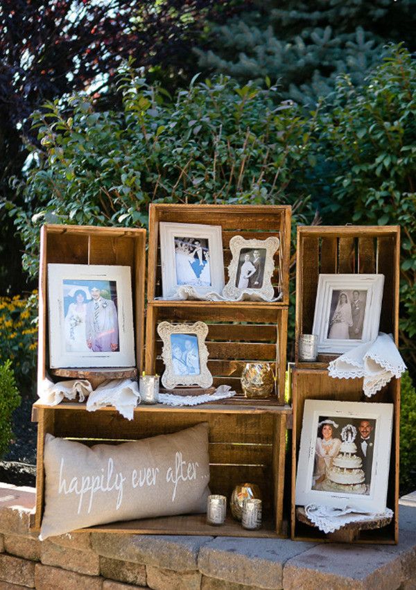 vintage photo display ideas with frames & old wooden crates for outdoor wedding decor