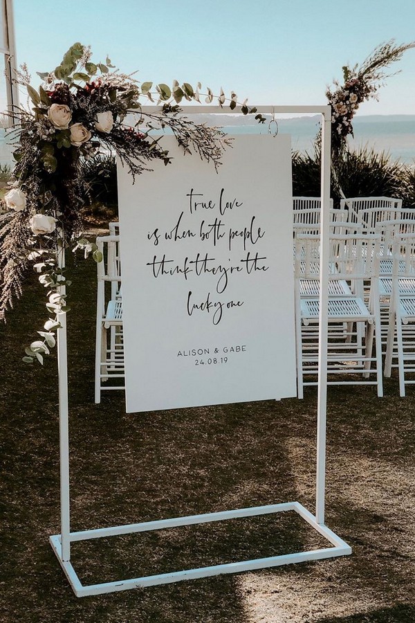 Minimalist white love quote sign to welcome your guests