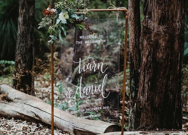 Rustic forest wedding welcome sign