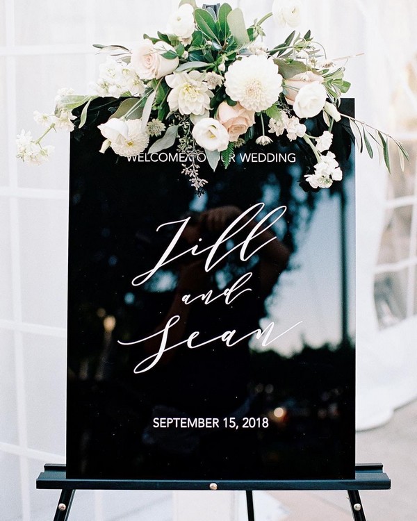 black acrylic welcome sign