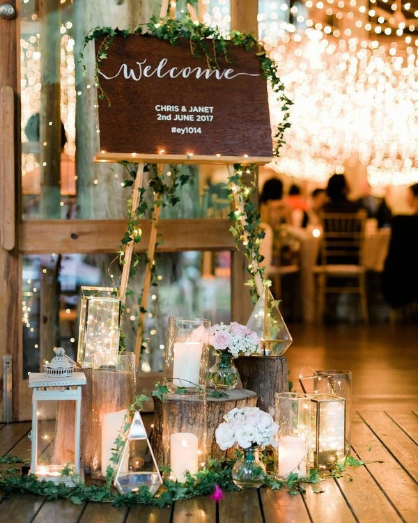 rustic wedding welcome sign entrance decoration with lanterns