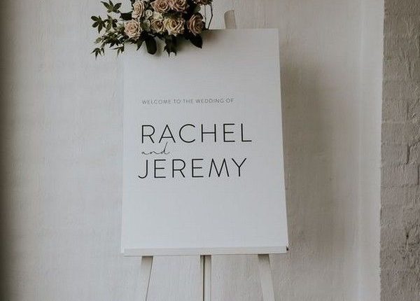 white wedding welcome sign with floral detail