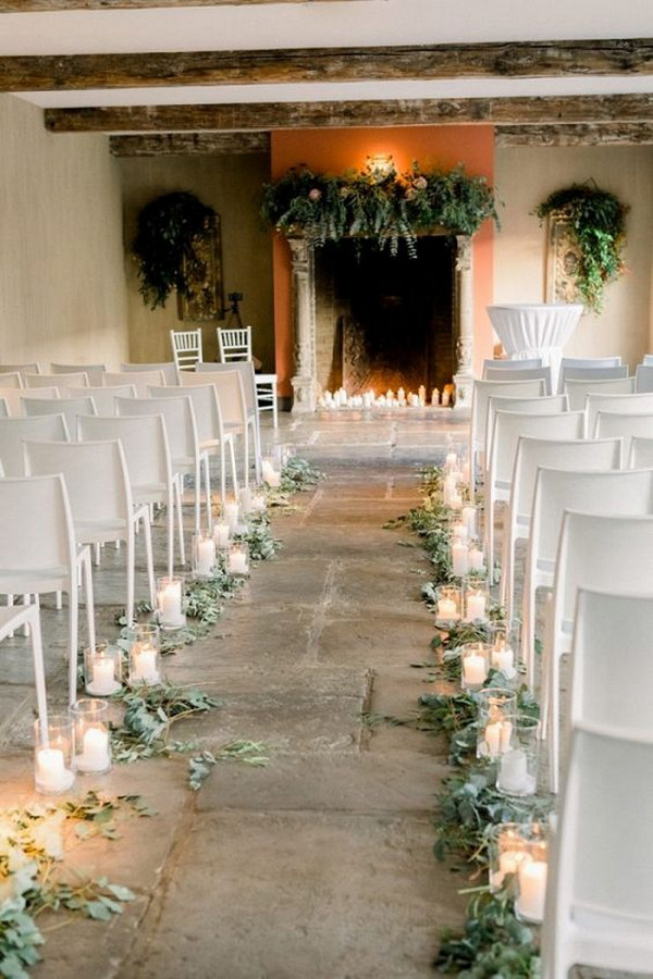 Indoor wedding ceremony with fireplace altar