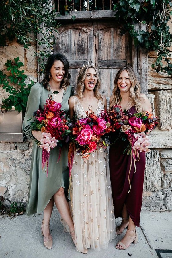 Mismatched bridesmaids wear shona joy with vibrant unstructured pink bouquets