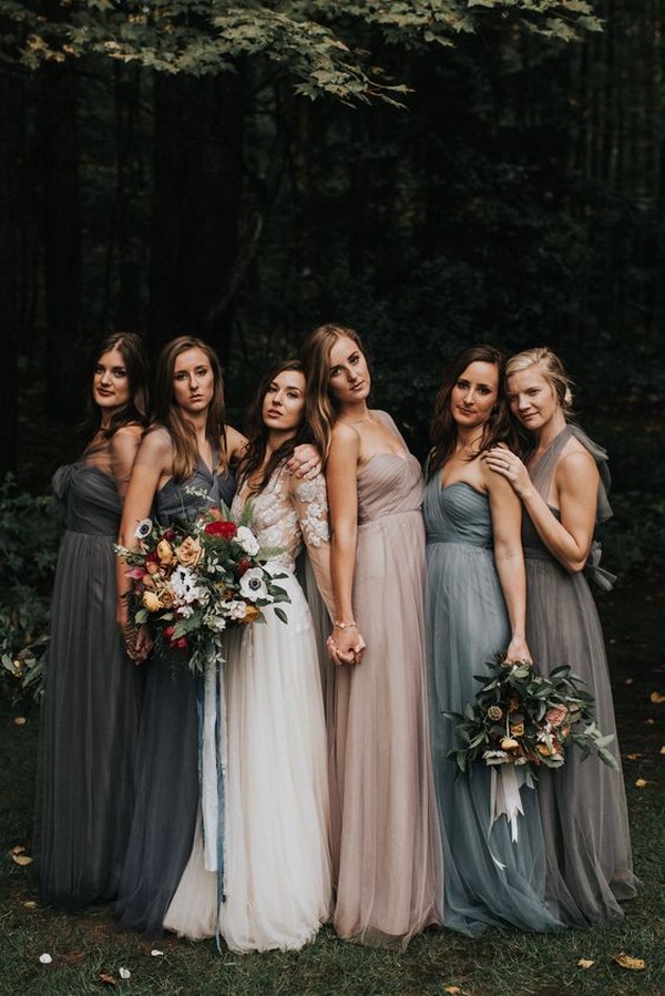 Moody bridesmaid photos with mismatched dresses