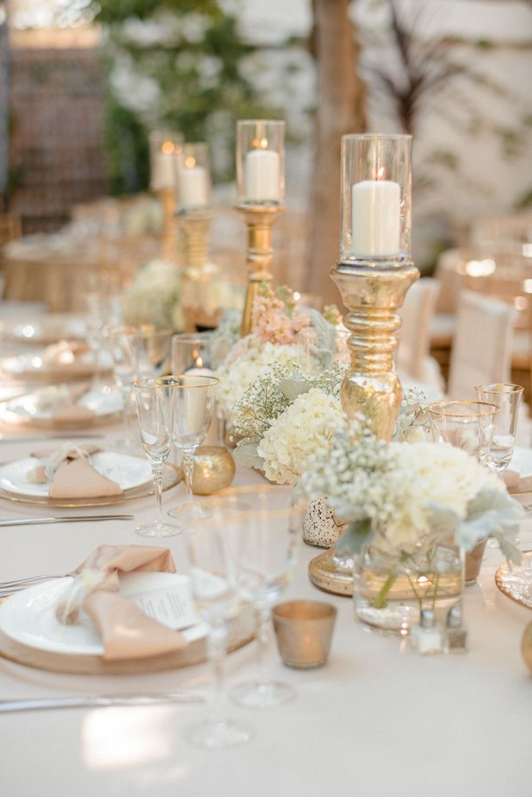 Romantic baby's breath and gold tall vases wedding centerpiece
