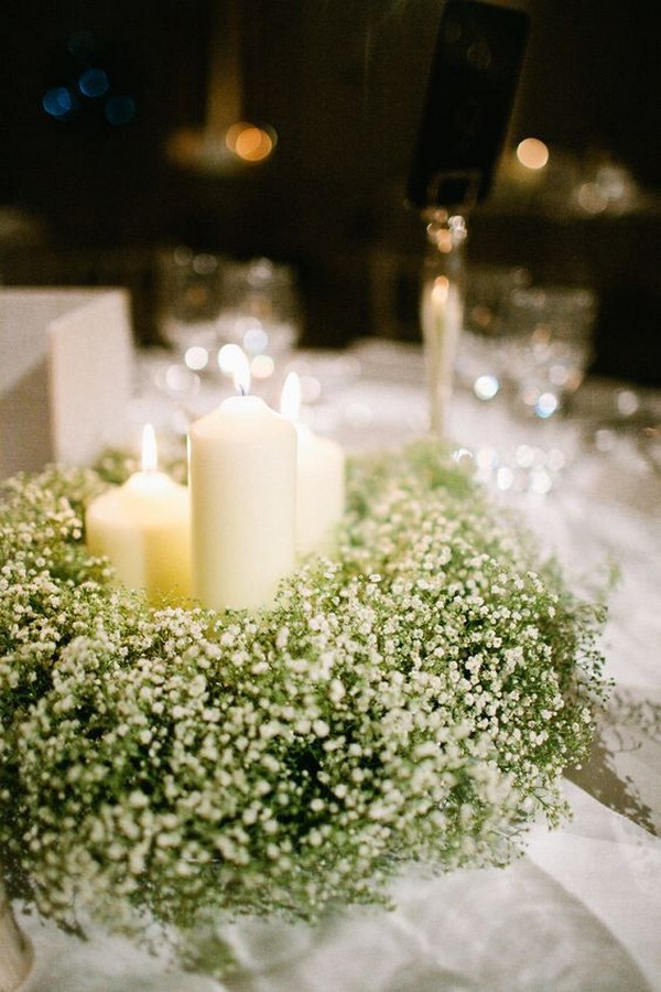 baby's breath around candles wedding centerpiece