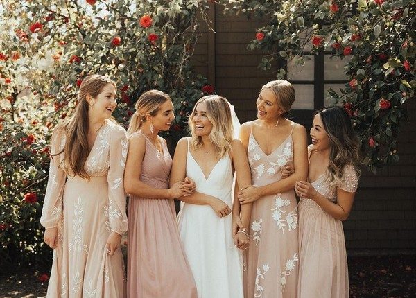 bhldn mismatched blush and lace long sleeves bridesmaid dresses