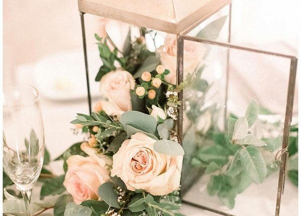 blush roses in gold lantern wedding centerpiece